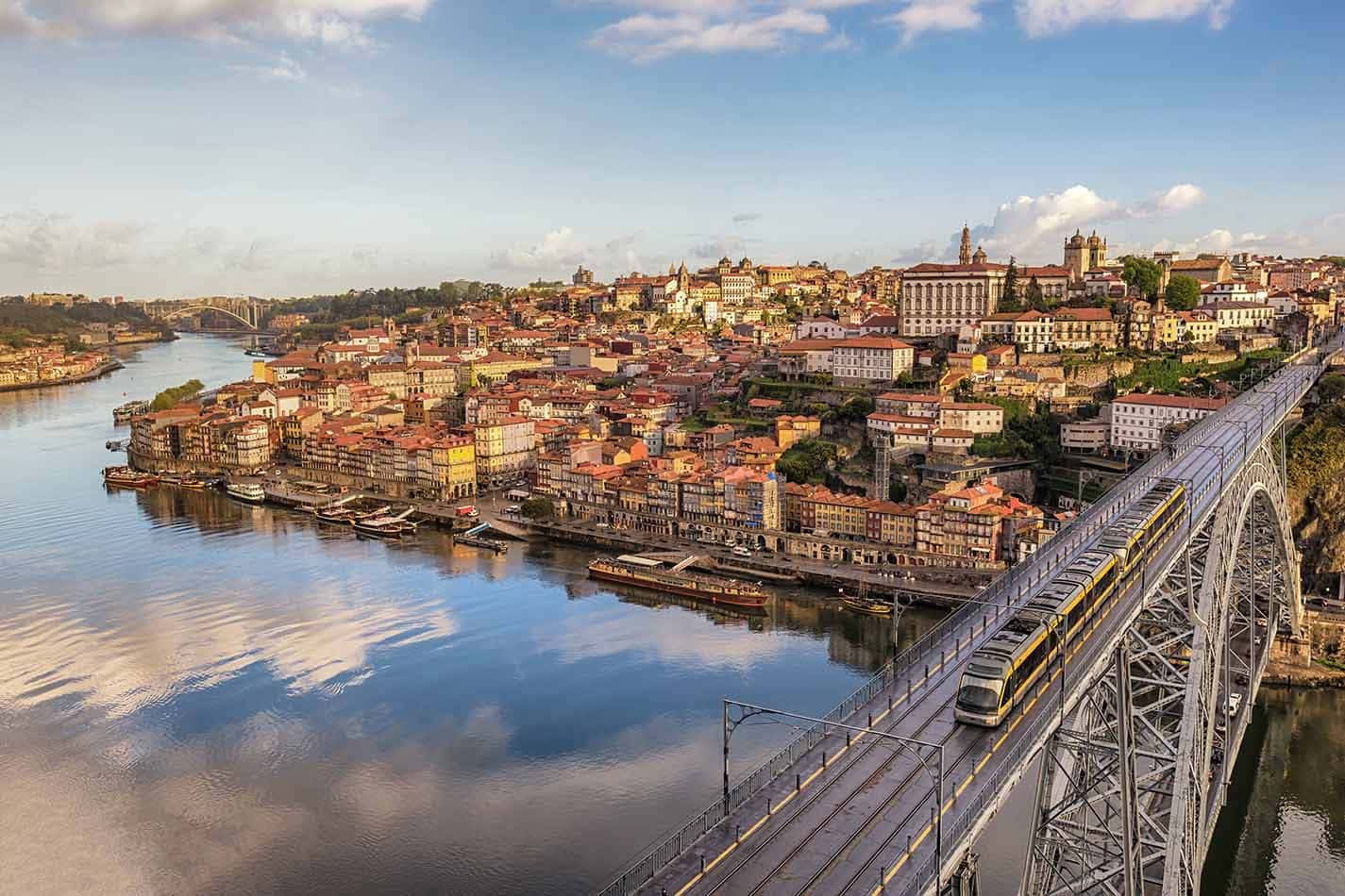Porto city skyline at Porto Ribeira and Douro River and Dom Luis I Bridge
