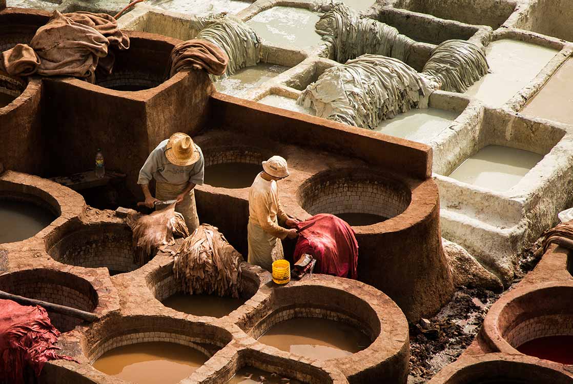 People on tour at the Fes Tanneries, Morocco