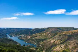 Scenic view of mountains, valleys, and river in Peneda-Gerês National Park Portugal showcasing natural beauty and landscape ideal for private Portugal tours